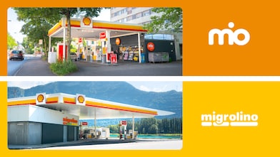 Photo de nuit d’un shop mio/migrolino dans une station Shell