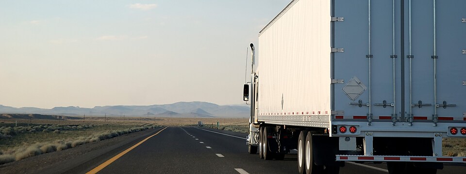 White_truck_on_remote_road